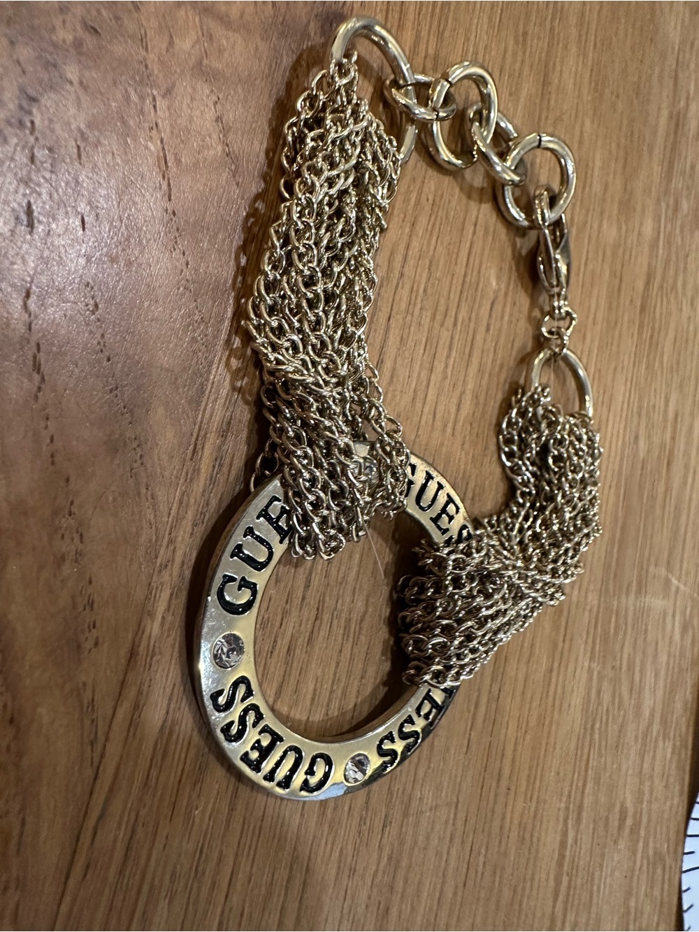 GUESS Gold-Tone Multi-Chain Logo Ring Bracelet with Crystal Accents - Picture 2 of 8